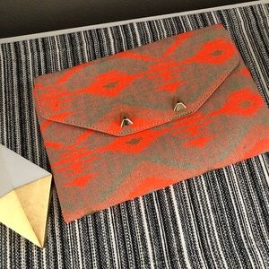 Aztec Coral- City Slim Clutch by Stella and Dot